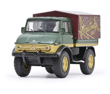 Preview: Schuco 452036300 -  1:64 Mercedes Unimog U406 "Christmas 2022", limitierte Weihnachtsedition