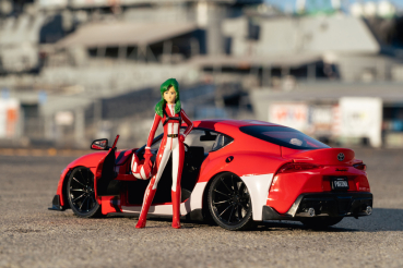 Jada 253255053 - 1:24 Robotech M. Sterling ´20 Toyota Supra rot mit Figur
