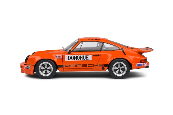 Solido 421186359 - 1:18 Porsche 911 IROC Daytona 1974 – #1 Donohue orange