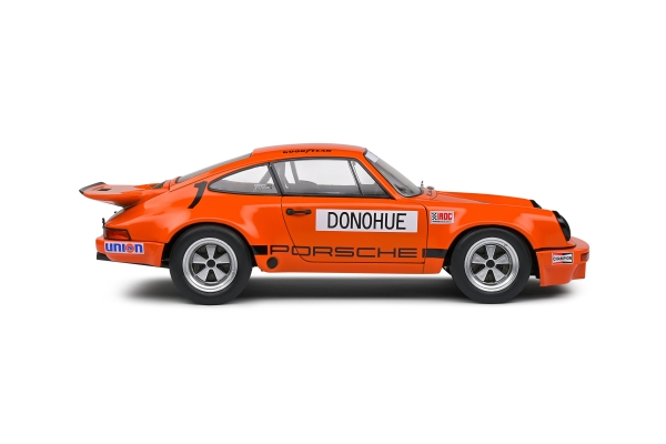 Solido 421186359 - 1:18 Porsche 911 IROC Daytona 1974 – #1 Donohue orange