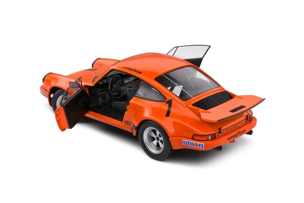 Solido 421186359 - 1:18 Porsche 911 IROC Daytona 1974 – #1 Donohue orange