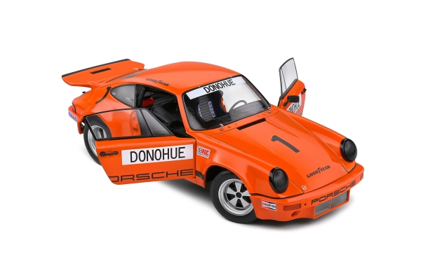 Solido 421186359 - 1:18 Porsche 911 IROC Daytona 1974 – #1 Donohue orange