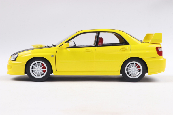 Solido 421186432 - 1:18 Subaru Impreza WRX STI SOLIDO WORKS Yellow gelb 2003